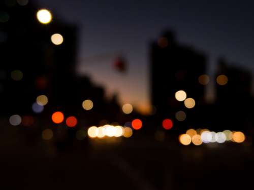Blurred City Street at Sunset