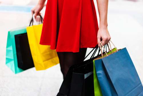 Woman With Black Friday Shopping Bags Free Photo