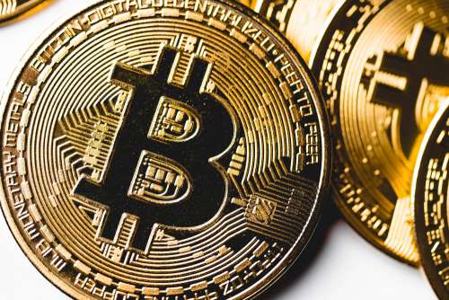 Golden Bitcoin Coin Close Up Free Photo