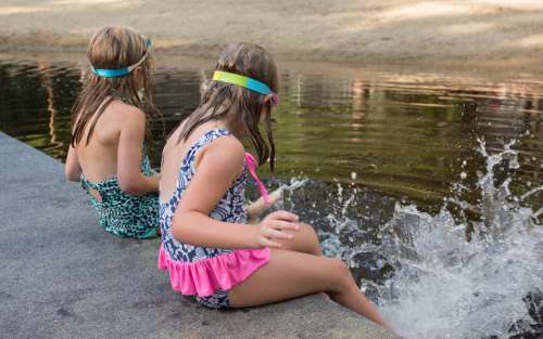 kids lake water splashing playing