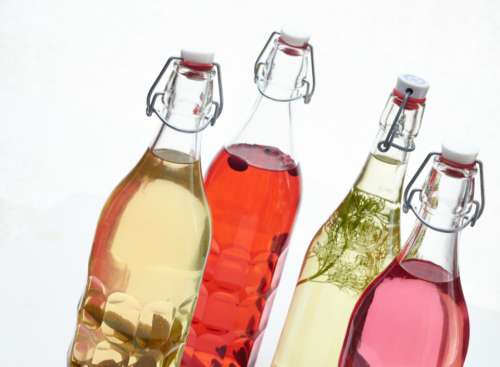 colored bottles spirits vodka herbs