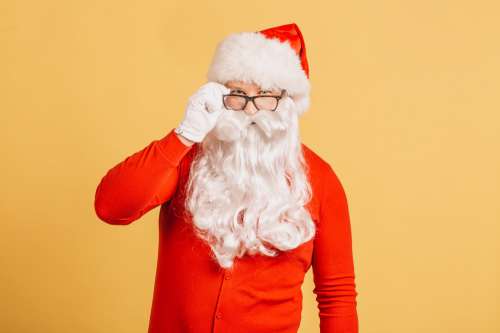 Santa Looks Over Glasses Rims Photo