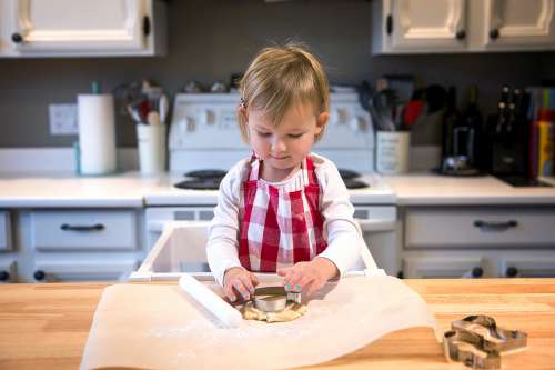 Child Makes Cookies Photo