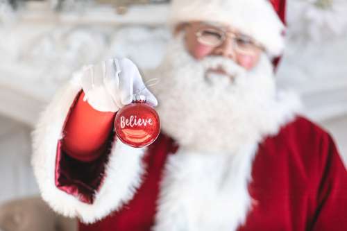 Santa Presents An Ornament Photo