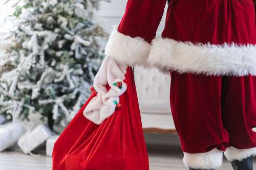 Santa Holds His Bag Of Toys Photo