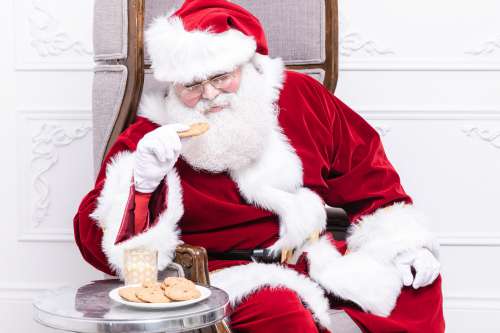 Santa Eats A Cookie Photo