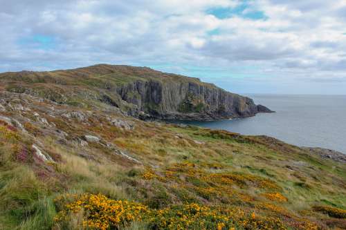 Green Cliffs Give Way To Watery Inlet Photo