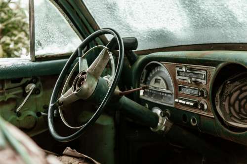 Antique Car In Junkyard Photo