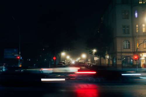 Car Streaks And Street Lamps Photo