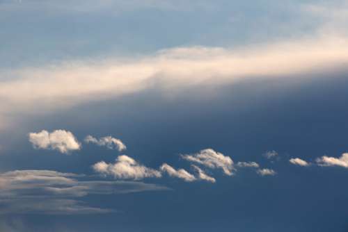 Puffy Clouds Background Free Photo