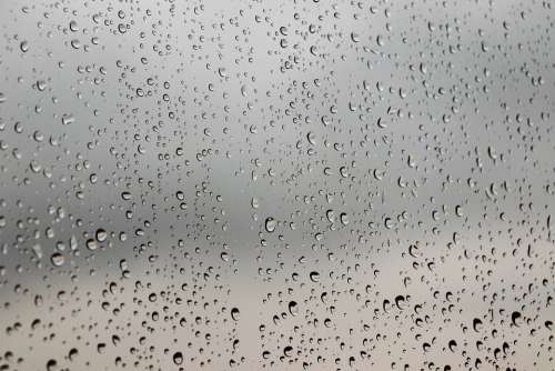 Rainy Day Water Drops Window Glass Grey Sky Clouds