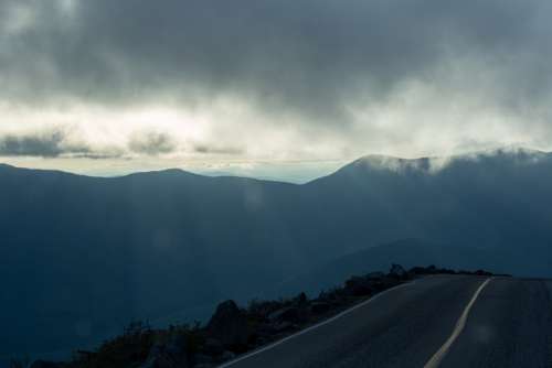 misty mountain road fog clouds