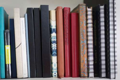 books shelf book notebook wall