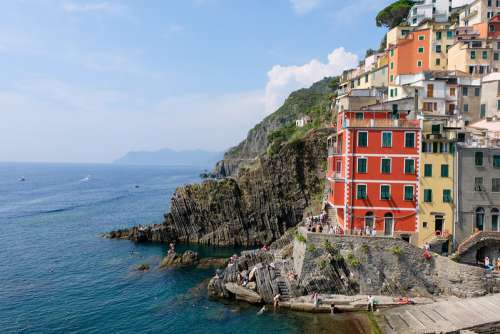 View of the Colorful Houses Along the Coastline of Cinque Terre Area in Riomaggiore, Italy