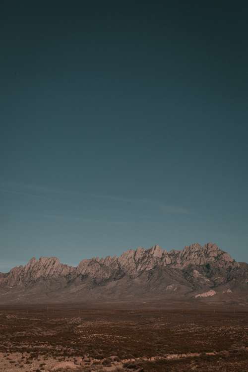 Deep Blue Sky And Mountains Photo