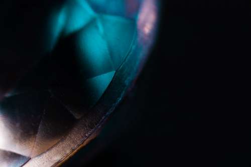 Blue Light Shimmers On A Gemstone Photo