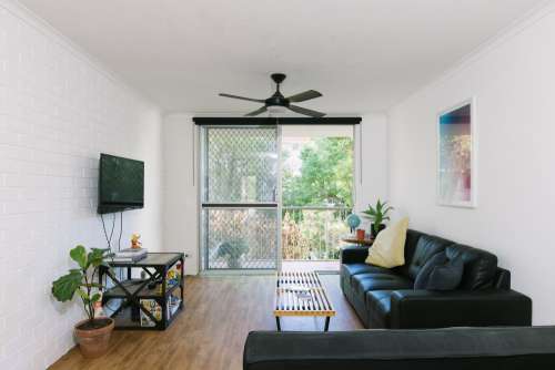 Family Room With Large Screen Doors Photo
