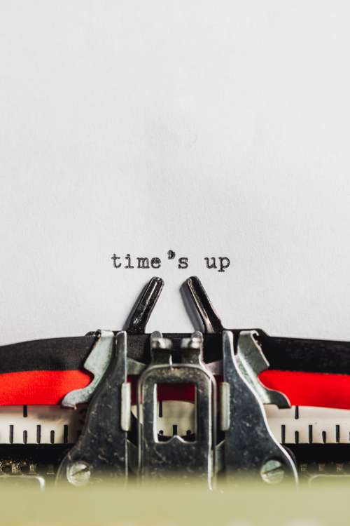 Text On Typewriter States 'Time's Up' Photo