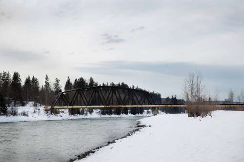 Bridge Over Snowy Waters Photo