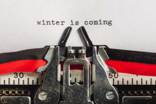 Text On Typewriter States Winter Is Coming Photo