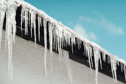 Icicles Hanging from Roof Free Photo