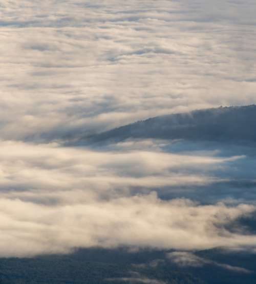 clouds mountain landscape wispy sky