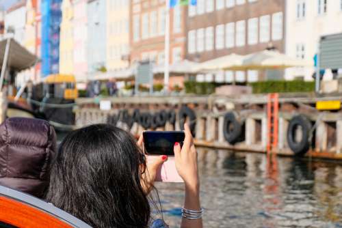 Tourist Taking Photos on Copenhagen Canal Tour