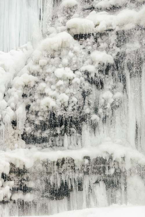 Water Flowing Over Ice Photo