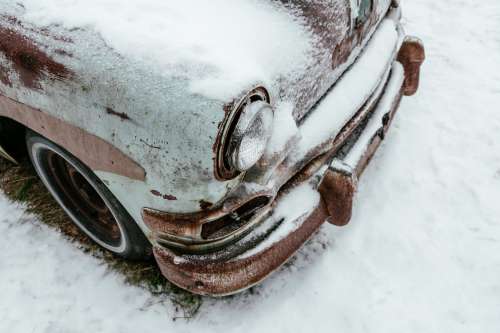 Rusting Bumper Under Snow Photo