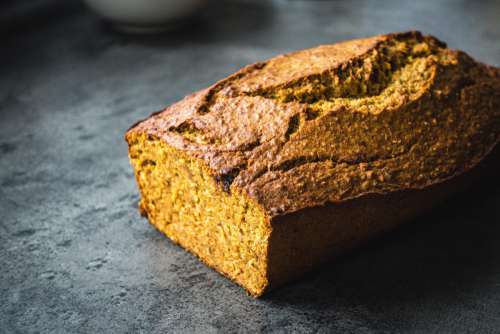 Yellow homemade banana bread with curcuma