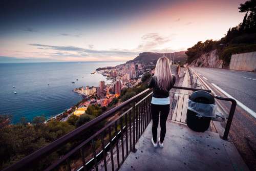 Young Woman Taking a Picture of Evening Monaco Free Photo