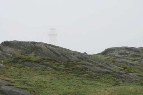 lighthouse coast landscape fog weather