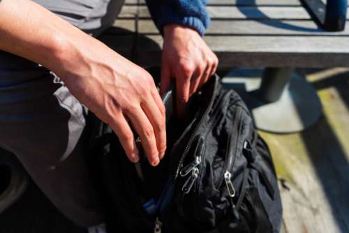 hands backpack travel bag close up