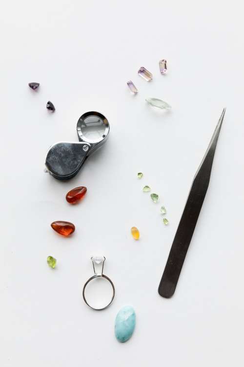 Gemstones And Tools Flatlay Photo