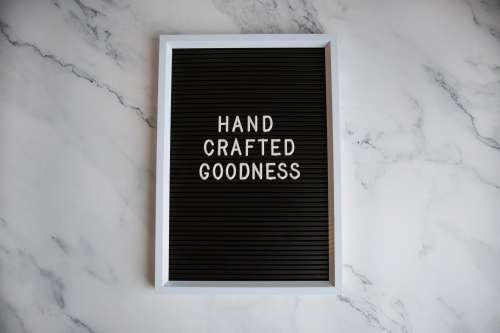 Handcrafted Goodness SIgn On Marble Photo