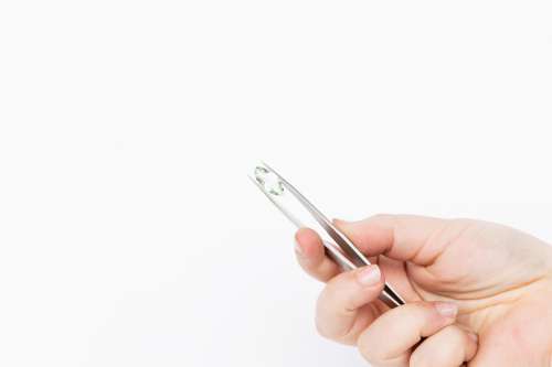 Gemstone Held In Tweezers Photo