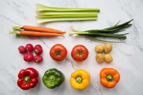 Fresh Vegetables Arranged On Chopping Board Flatlay Photo