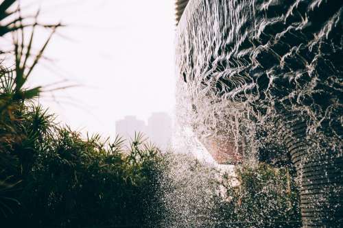 Water Ripples Down The Side Of A Fountain Photo