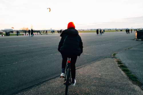 Cyclist With Red Hat Photo