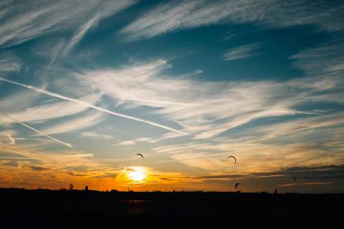 Kite Flying During Sunset Photo