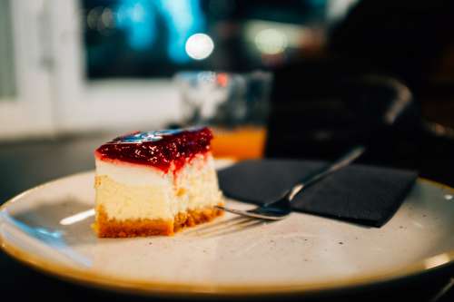 Nearly Finished Slice Of Cheesecake Photo