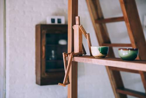 Wooden Figure On A Shelf Photo