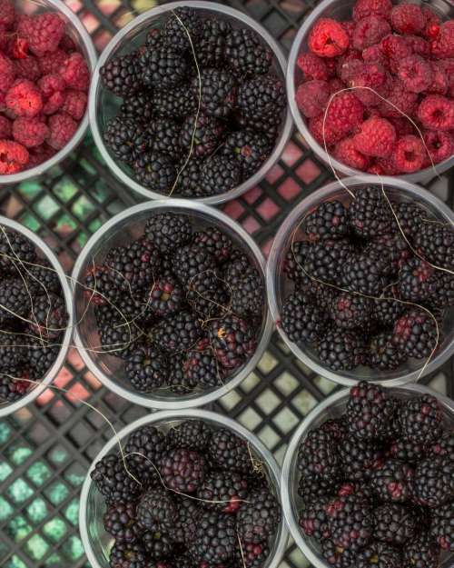 Overhead view of raspberries and blackberries