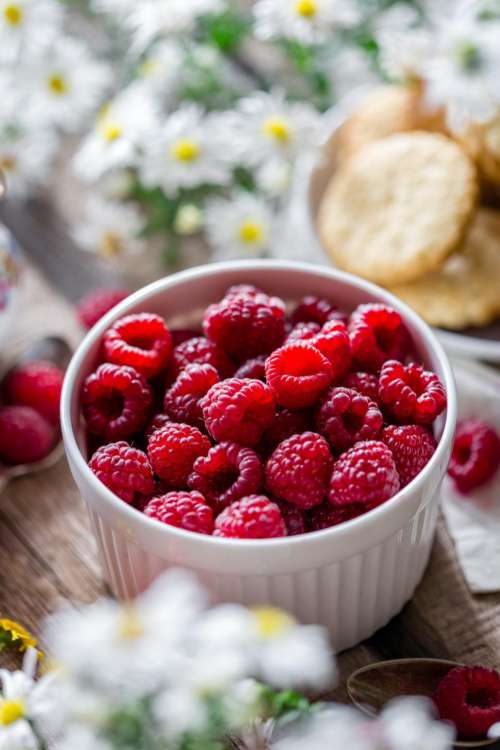 Close up of a bowl of raspberries