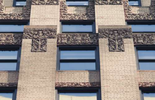 building ornate detail windows brick