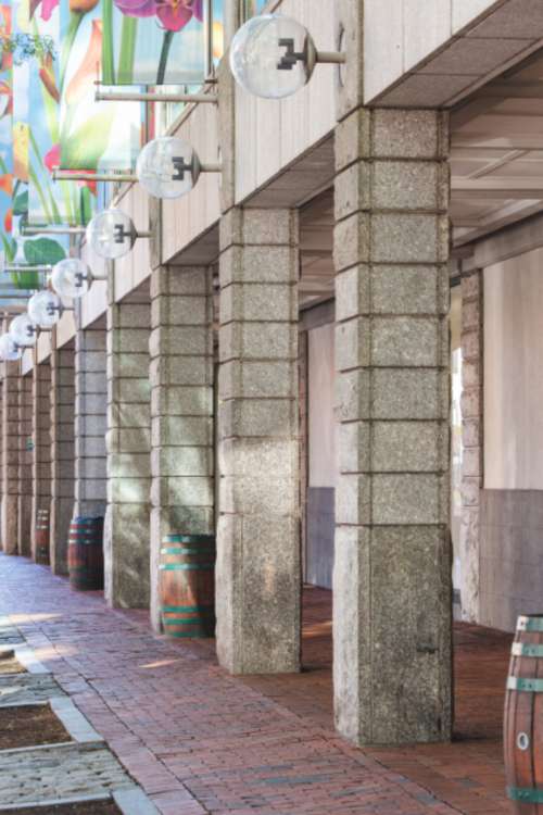 brick sidewalk city building facade