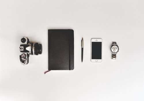 Retro Film Camera, Notebook, Pen, Smartphone and Watch
