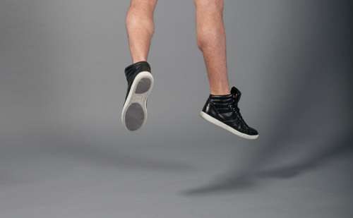 Mens Fashion Kicks Jumping On Grey Background