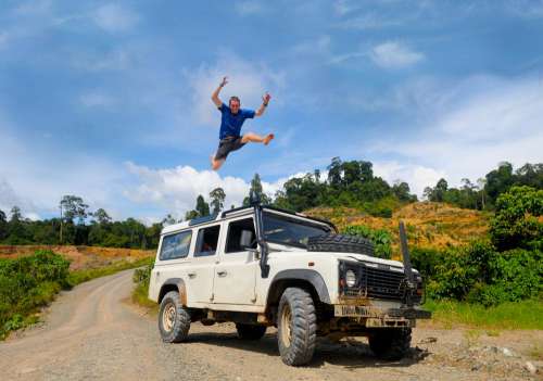 Man Jumping On Top Of 4×4 Car In Celebration