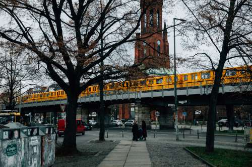 Yellow Subway Train Over Downtown Photo